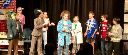 From the SCHOOLNAME production (CITY, STATE). Directed by DIRECTOR.

Photo Credit: PHOTOGRAPHER